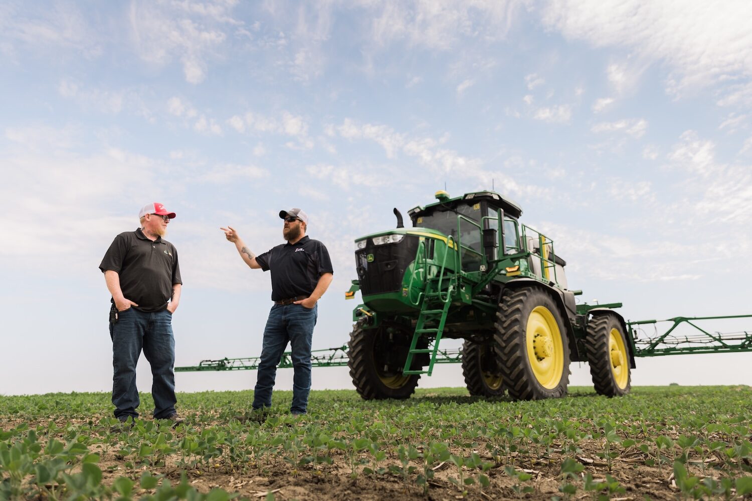 9773228065044-Applicator by Sprayer in Field 8016 applicator by sprayer in field with farmer dealer talking
